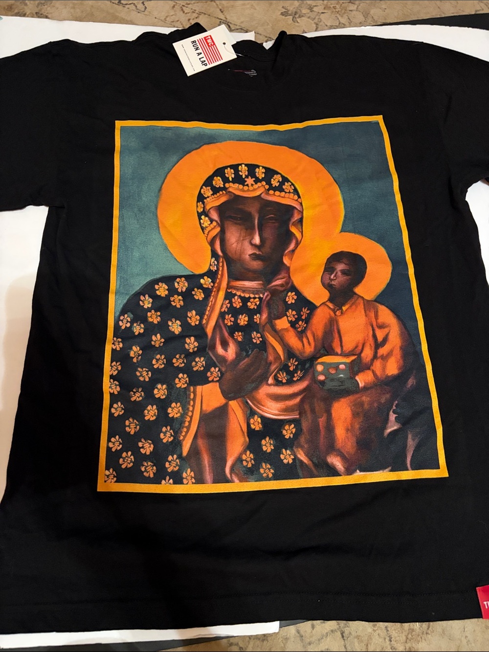 NWT The Marathon Clothing Black T‑Shirt Of Black Madonna from PACSUN
